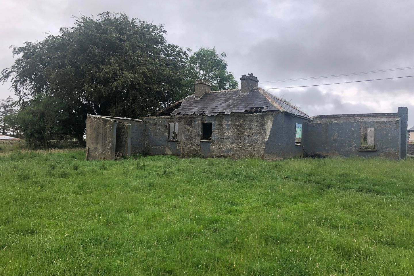 Derelict house on c. 1 acre Menlough Village, Menlough, Co. Galway