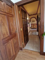 Back hallway that runs between kitchen and living room