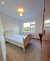 Bedroom 2 with basin and storage