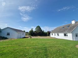 Rear of bungalow facing Garage
