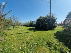 The lawn on the right is the front garden that leads to the left middle garden