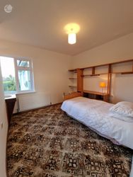 Bedroom 1 with basin and storage